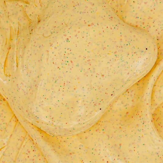 Close up texture of yellow putty with multicolored specs.